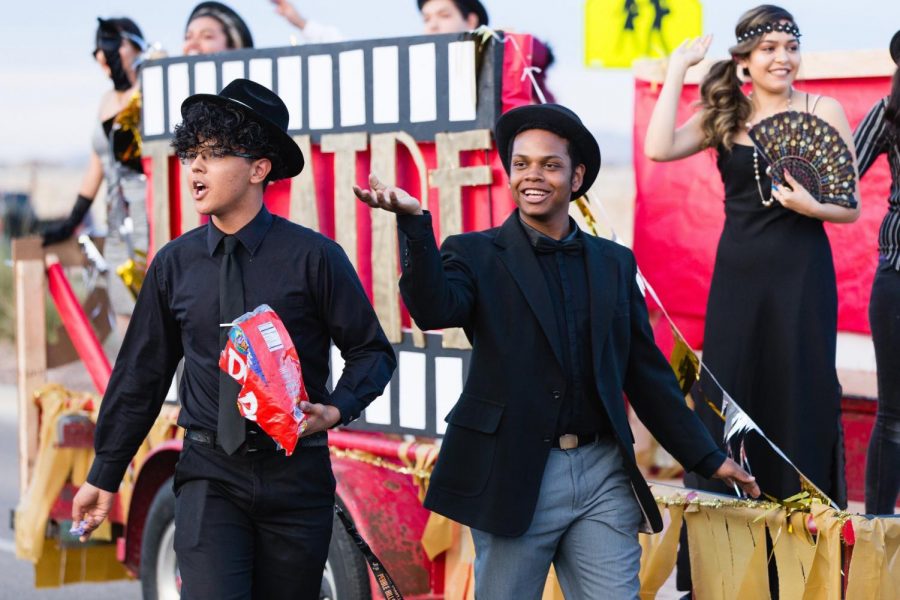Theater students walking down the street during the parade Oct. 18.
