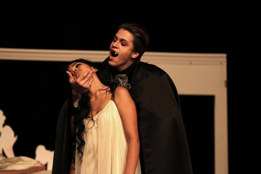 Junior Elizandro Gonzalez takes the stage as Dracula and attempts to take a bite out of Lucy, performed by Maria Gonzalez. The opening night was on Oct. 26. 