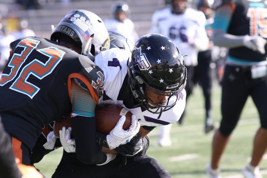 Senior Chaz Clemons tackles Franklin receiver in the first half Saturday morning, Nov 2 at the SISD Student Activities Center.