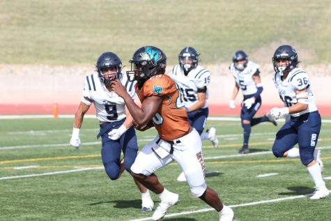 Sophomore Zereian Quarles runs the ball in the first quarter against Del Valle Friday afternoon Sept. 2 as the Spartans win big over Del Valle. 