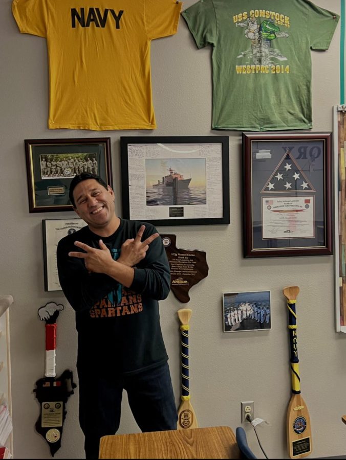 Mr. Enciso in his classroom showcasing his dedication to the United States. Photo by Edna Alvarez