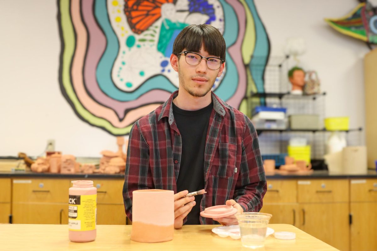 Senior Michael Hernandez works in his ceramics class Tuesday afternoon, April 21. Photo by Fabiola Alvarado