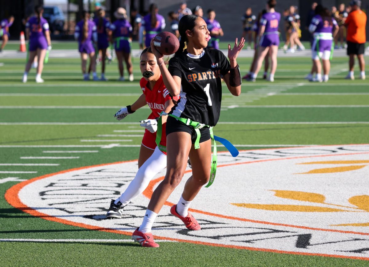 Junior Anahilyn Lopez drops back for a pass during the game against Bel Air Monday afternoon, April 20. Photo by Emily Ortiz 